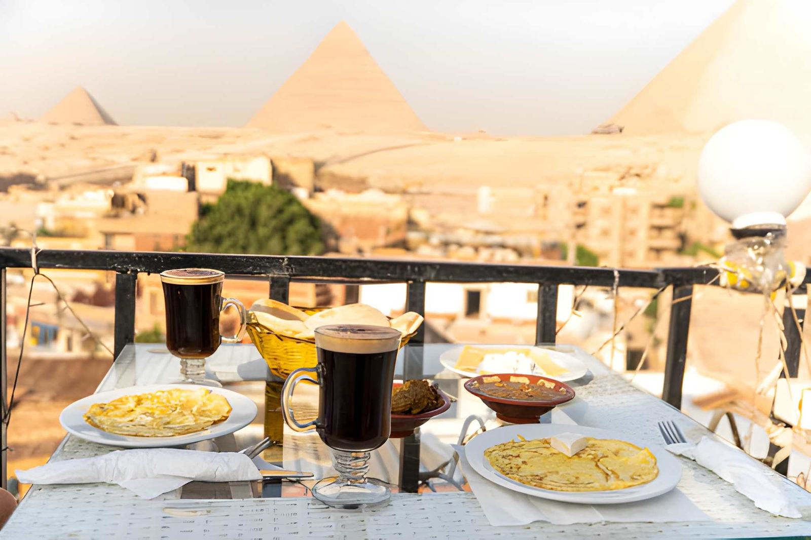 Breakfast table with a view of the pyramids